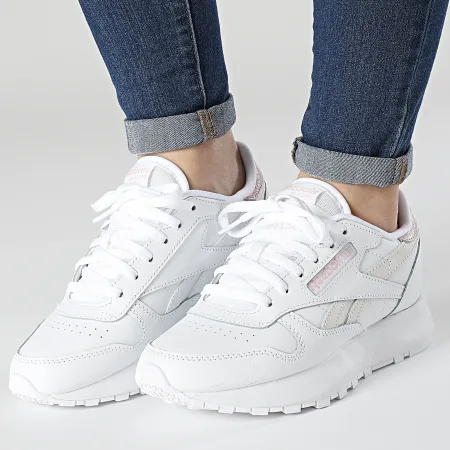 Pink and white reebok classics best sale