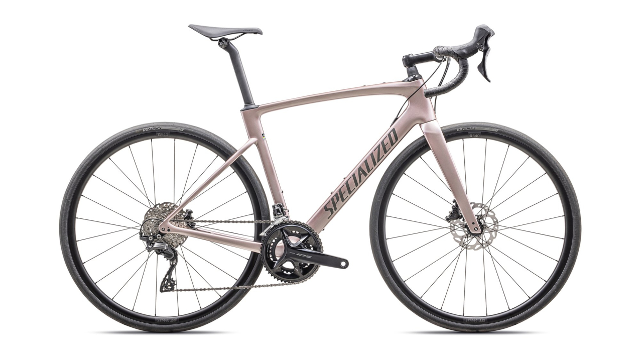 Шоссейные велосипеды Specialized Roubaix SL8 Sport 105 2025 Gloss Champagne / Smoke Артикул 94425-6064, 94425-6052, 94425-6044, 94425-6054, 94425-6049, 94425-6061, 94425-6058, 94425-6056