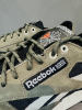 Кроссовки Кроссовки Reebok Classic Leather core black/army green/stucco Артикул GX480512, GX480511.5, GX480510.5, GX48057.5, GX48059, GX48058.5, GX480510, GX48058, GX480511, GX48059.5