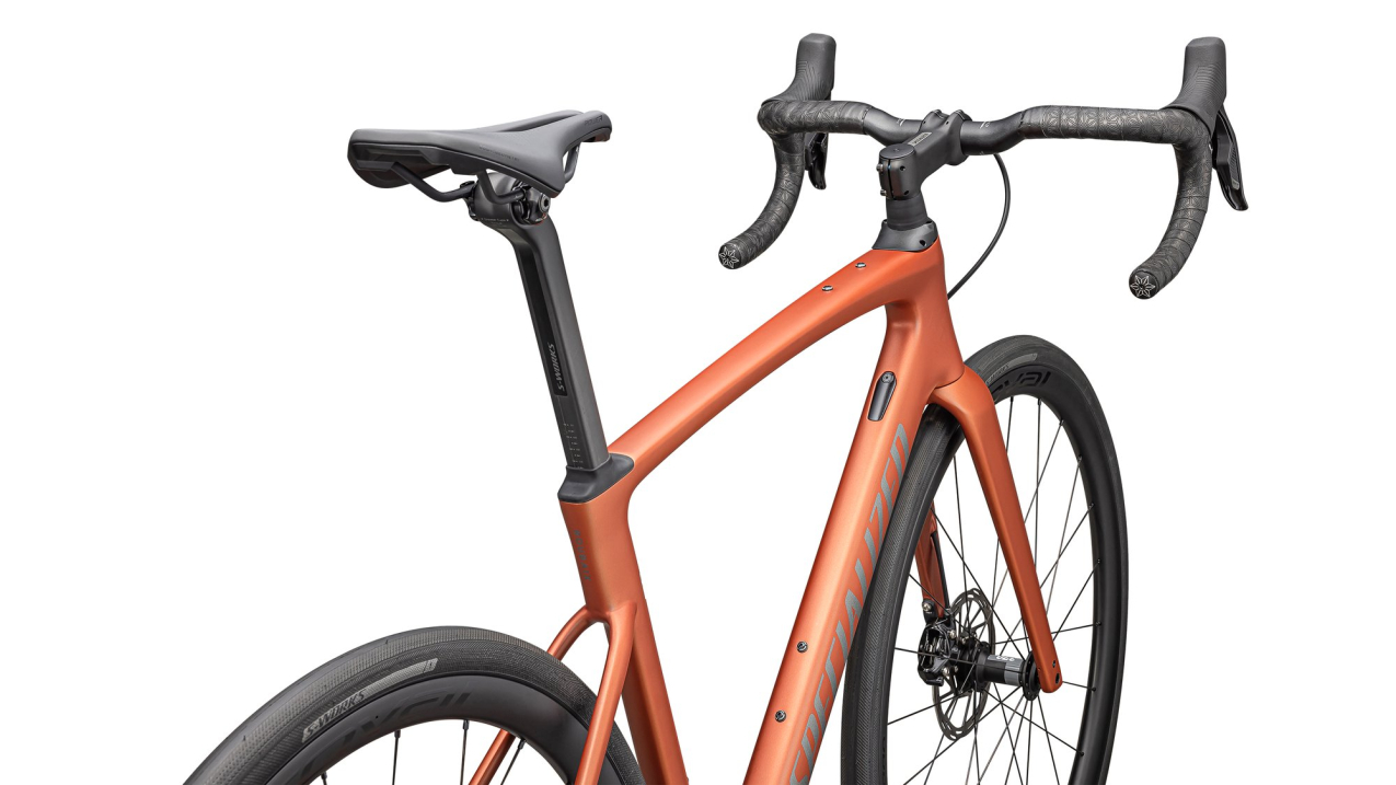 Шоссейные велосипеды Specialized Roubaix Expert 2025 Satin Copper / Smoke Артикул 94425-3052, 94425-3049, 94425-3044, 94425-3054, 94425-3056, 94425-3058, 94425-3061, 94425-3064