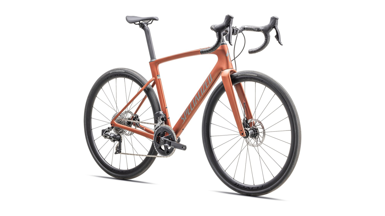 Шоссейные велосипеды Specialized Roubaix Expert 2025 Satin Copper / Smoke Артикул 94425-3052, 94425-3049, 94425-3044, 94425-3054, 94425-3056, 94425-3058, 94425-3061, 94425-3064