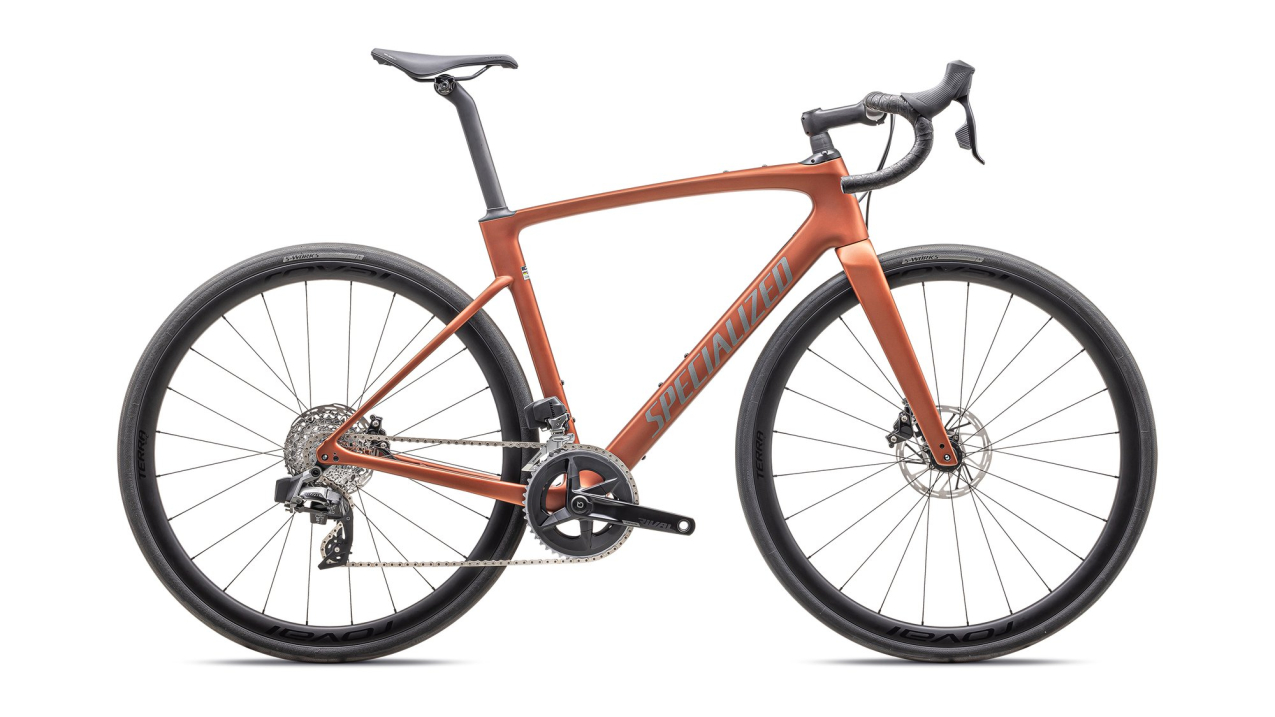 Шоссейные велосипеды Specialized Roubaix Expert 2025 Satin Copper / Smoke Артикул 94425-3052, 94425-3049, 94425-3044, 94425-3054, 94425-3056, 94425-3058, 94425-3061, 94425-3064